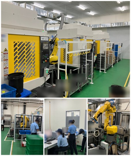 明和ベトナムの作業現場。安全柵とともに整然と並ぶロボット付きマシニングセンタ、ロボットセルの前で作業する現地スタッフ、確認作業をするスタッフ、部品を扱う産業用ロボット